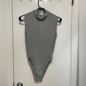 Gray, open-back turtleneck bodysuit